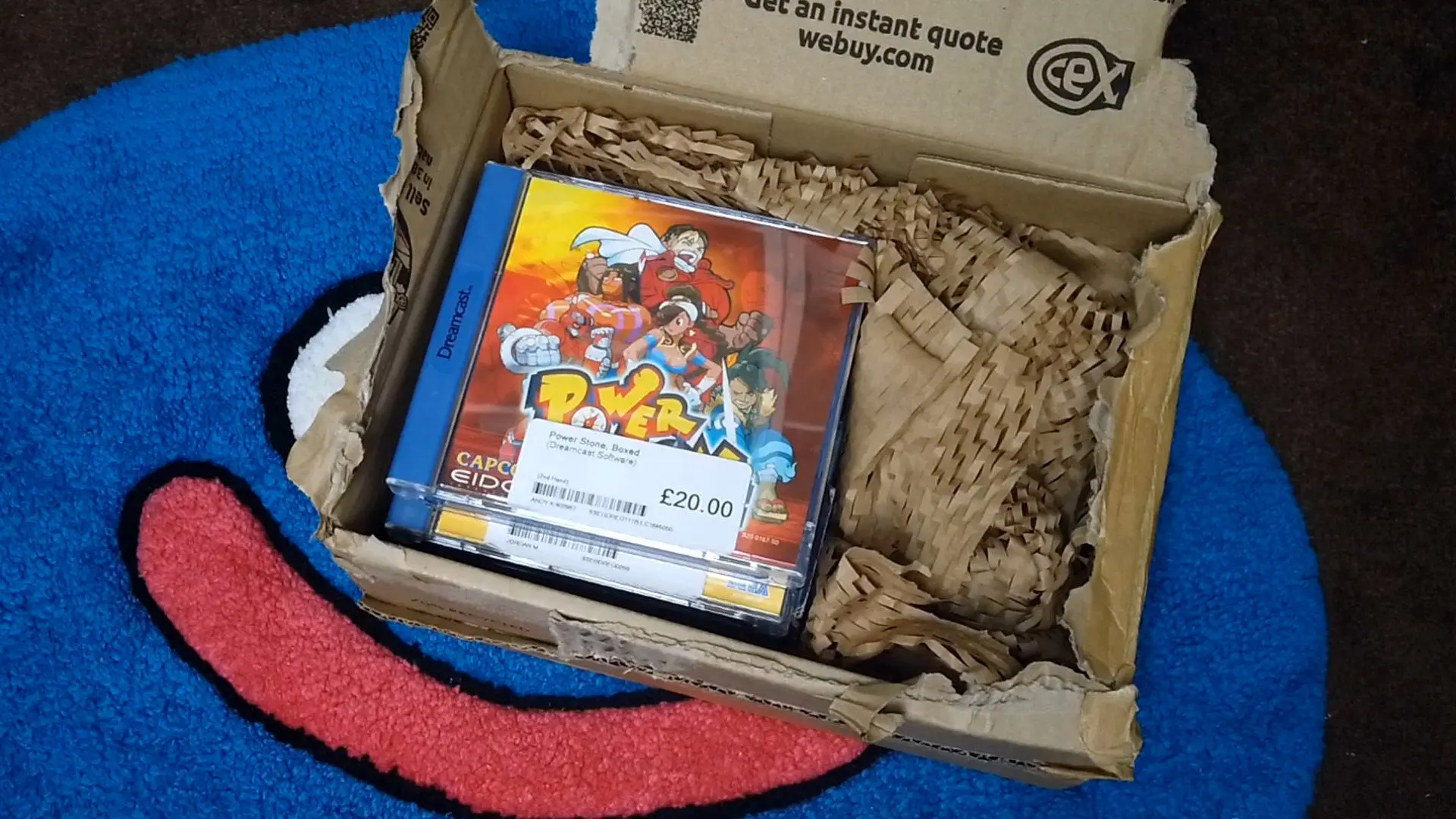 A photo of me unboxing the Dreamcast game Power Stone